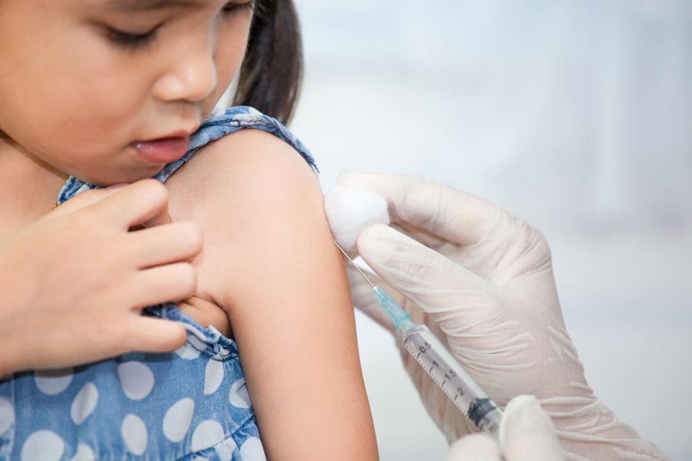 child getting a flu shot